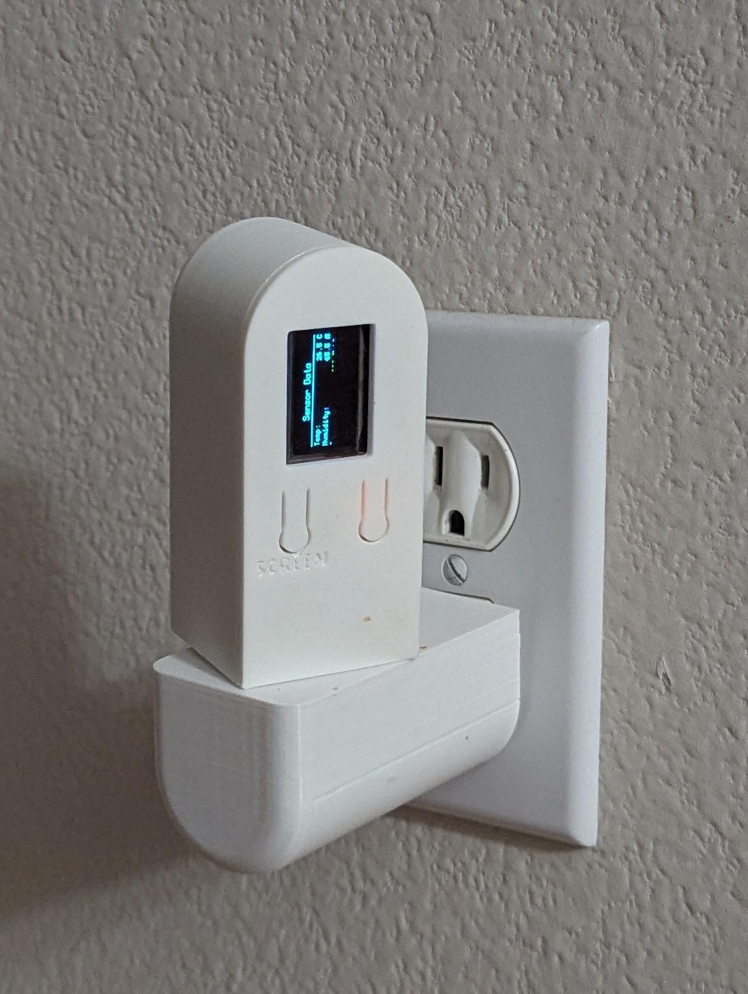 Wall-mount sensor installed with OLED display active